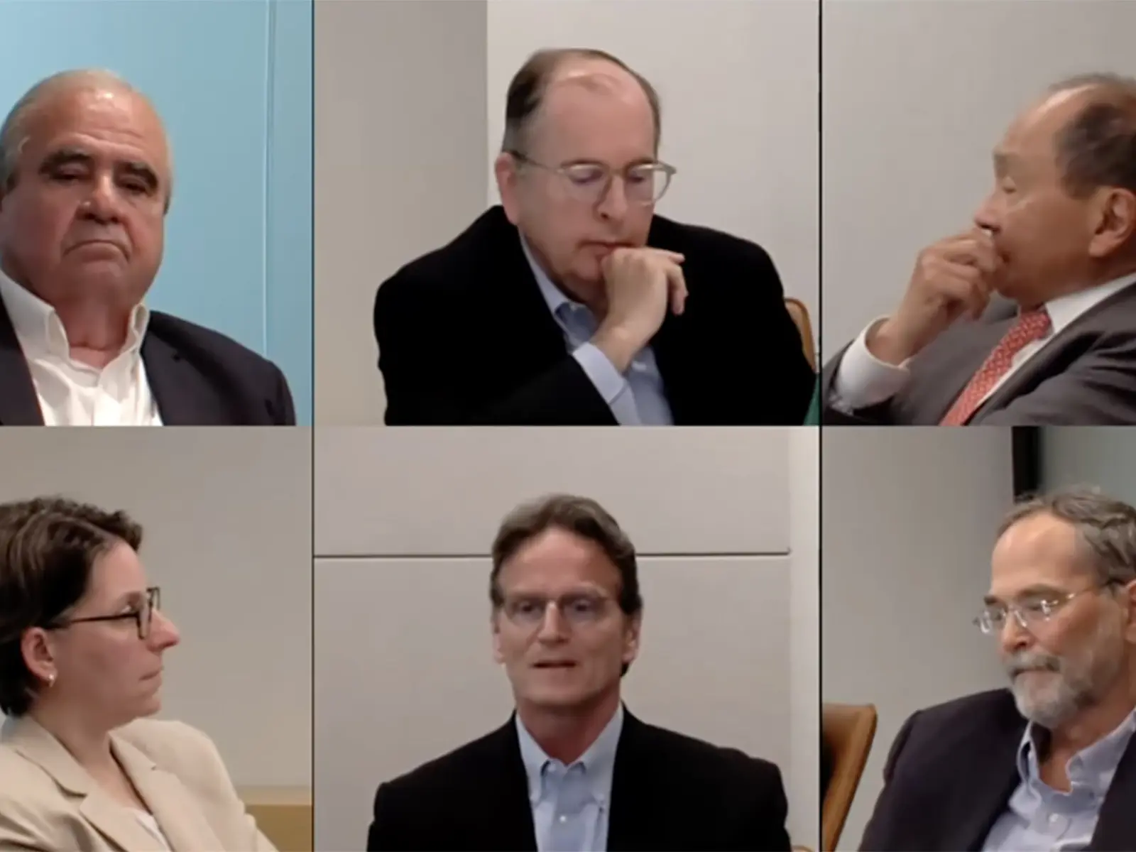 Six individuals in a grid layout of a video webinar screenshot with thoughtful expressions.