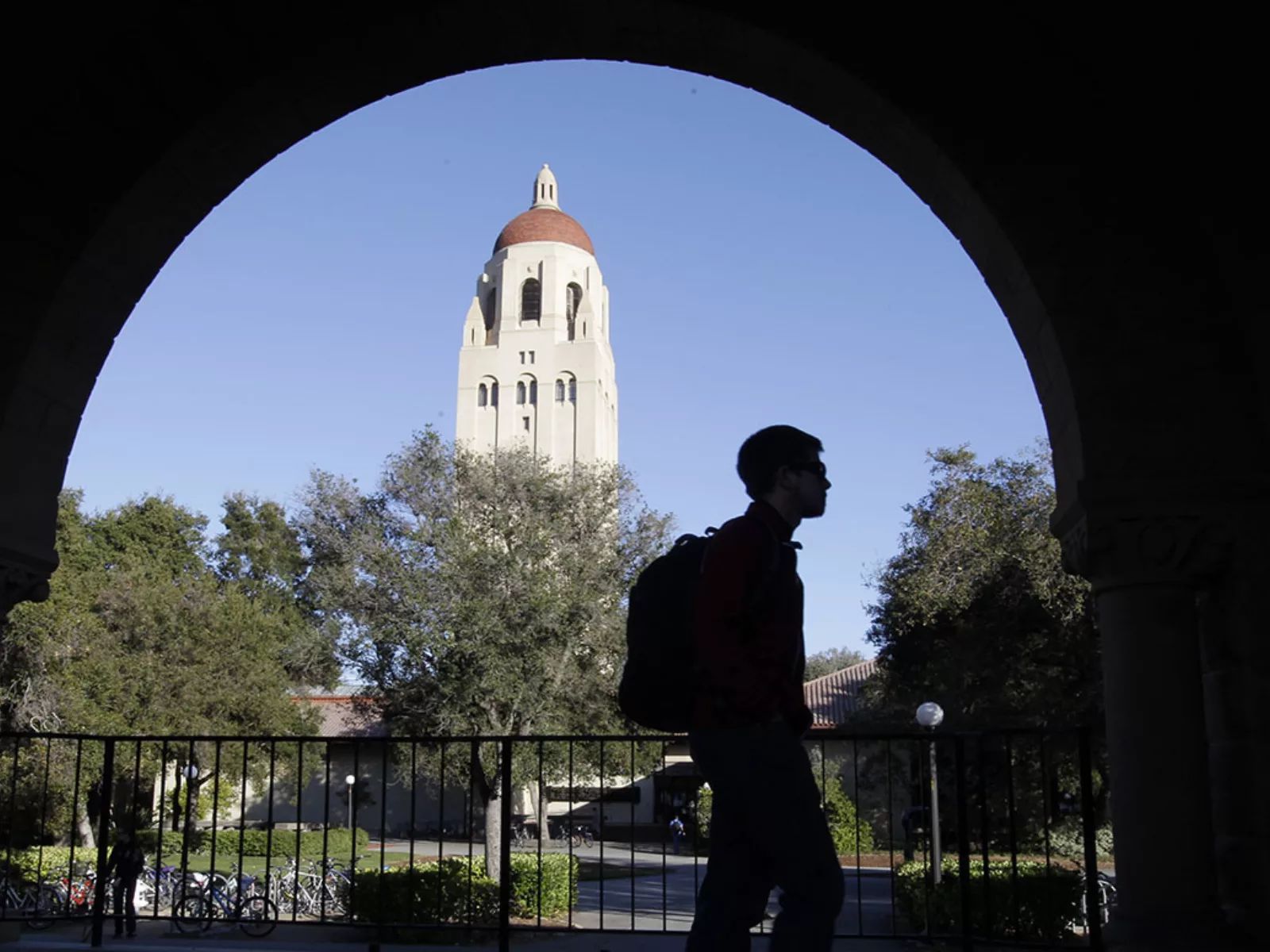 A student walks on a college campus
